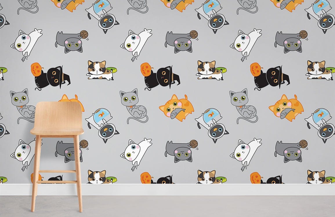 Cute cartoon cats wallpaper on grey background with wooden chair; ideal for children's room decor.