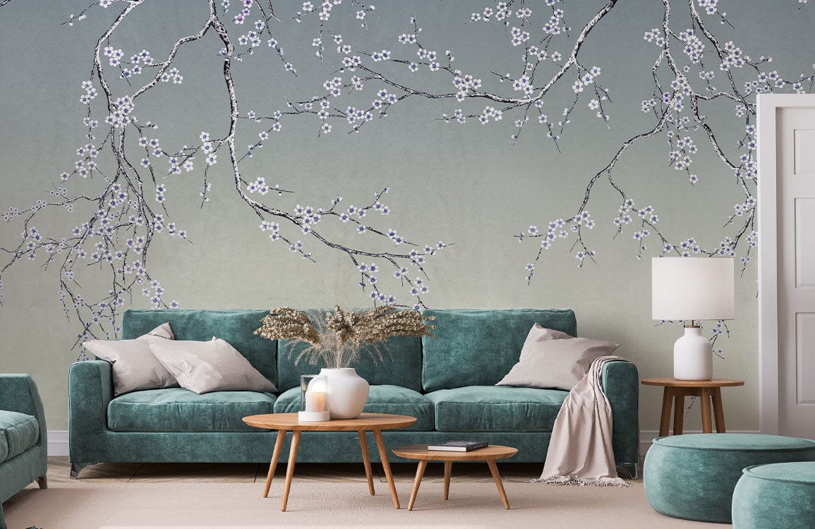 Elegant Blossom Branches gradient wallpaper; teal sofas, round wooden tables, living room decor, beige carpet.