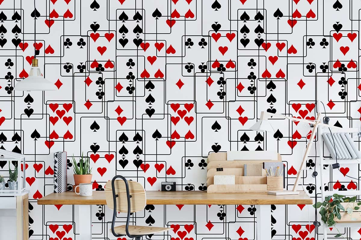Stylish casino card suit wallpaper, wooden desk, modern chair, in chic interior room setting.