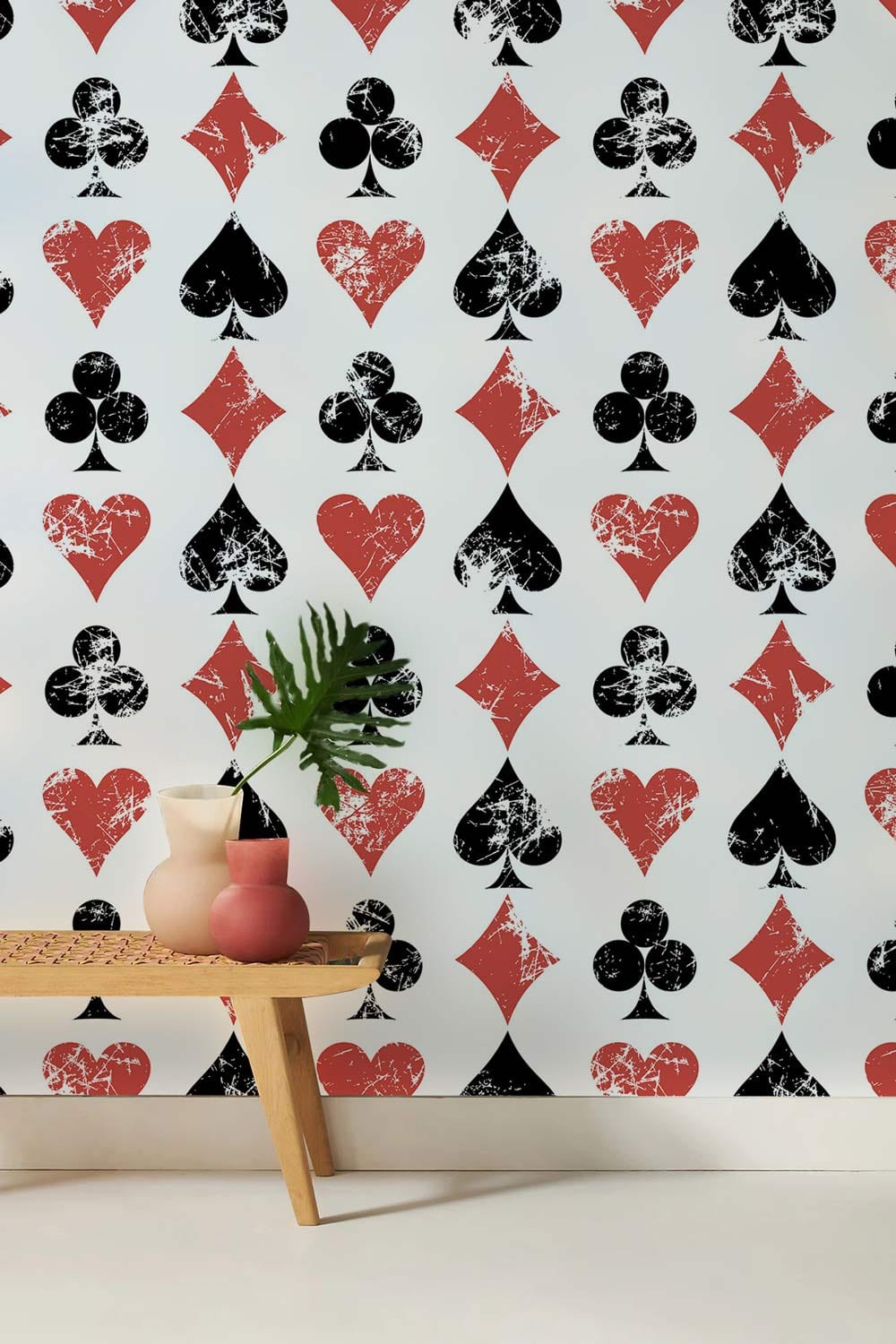 Vintage playing card black red pattern wallpaper, wooden bench, minimalist decor, white flooring, contemporary style.