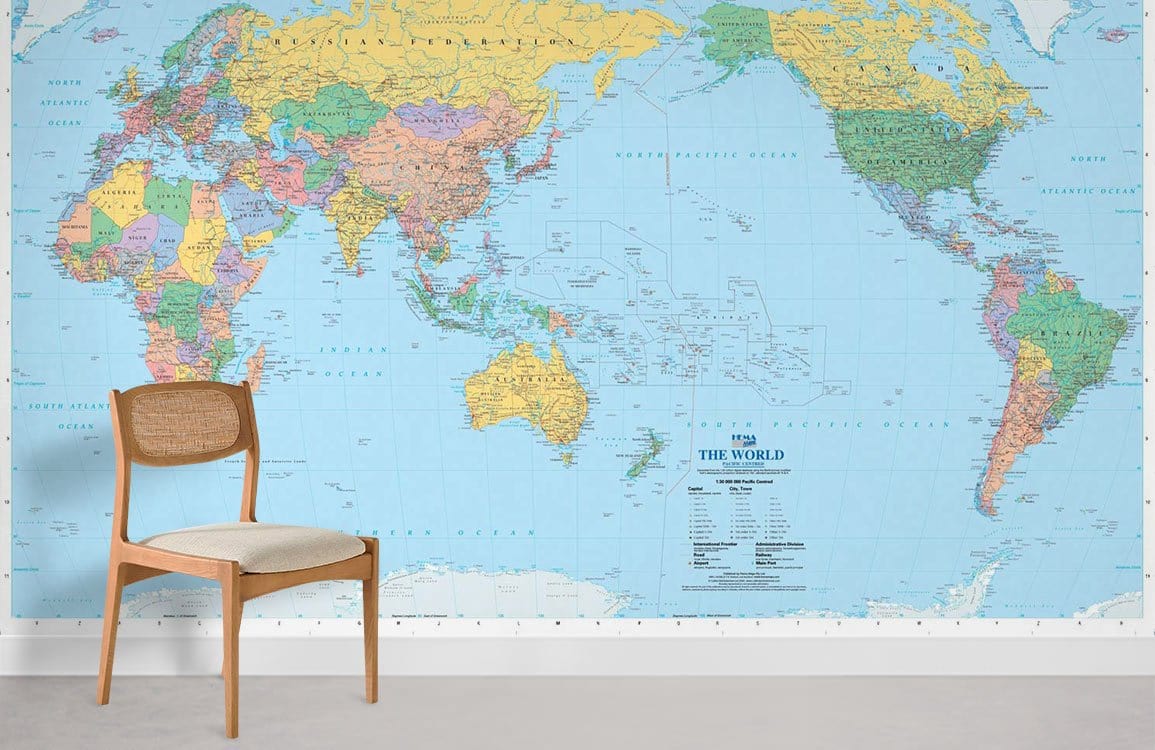 Vintage World Map Mural Wallpaper in living room, featuring beige wooden chair and grey flooring.