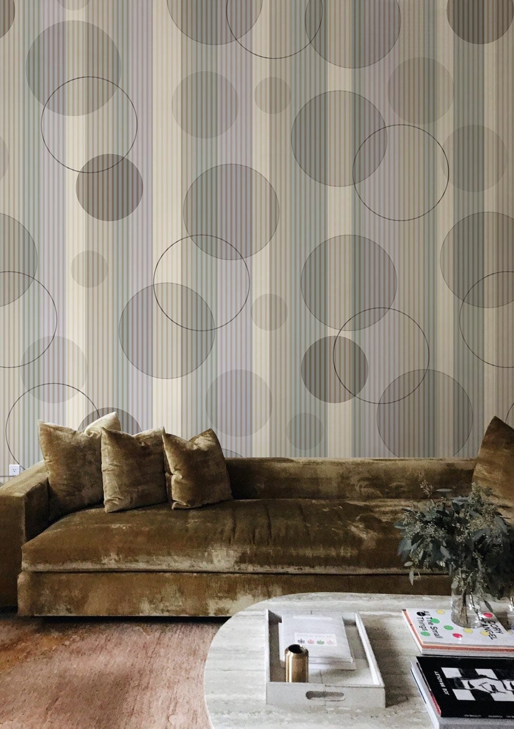 Elegant Grey Circles Wallpaper in modern living room with velvet sofa, wooden flooring, and coffee table.