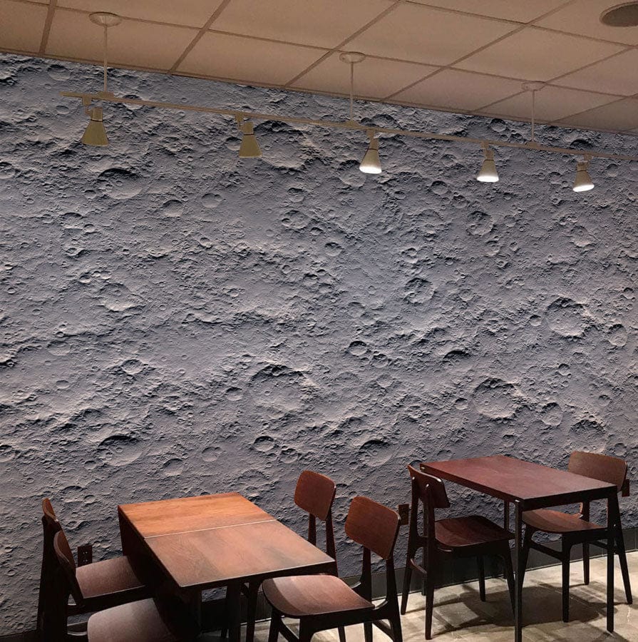 Lunar Surface Grey Wallpaper with Moon Crater Design, cafe setting, wooden tables and chairs, ceiling lights.