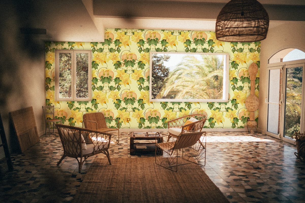 Elegant floral wallpaper adorns living room with wicker furniture, patterned flooring, and large windows.