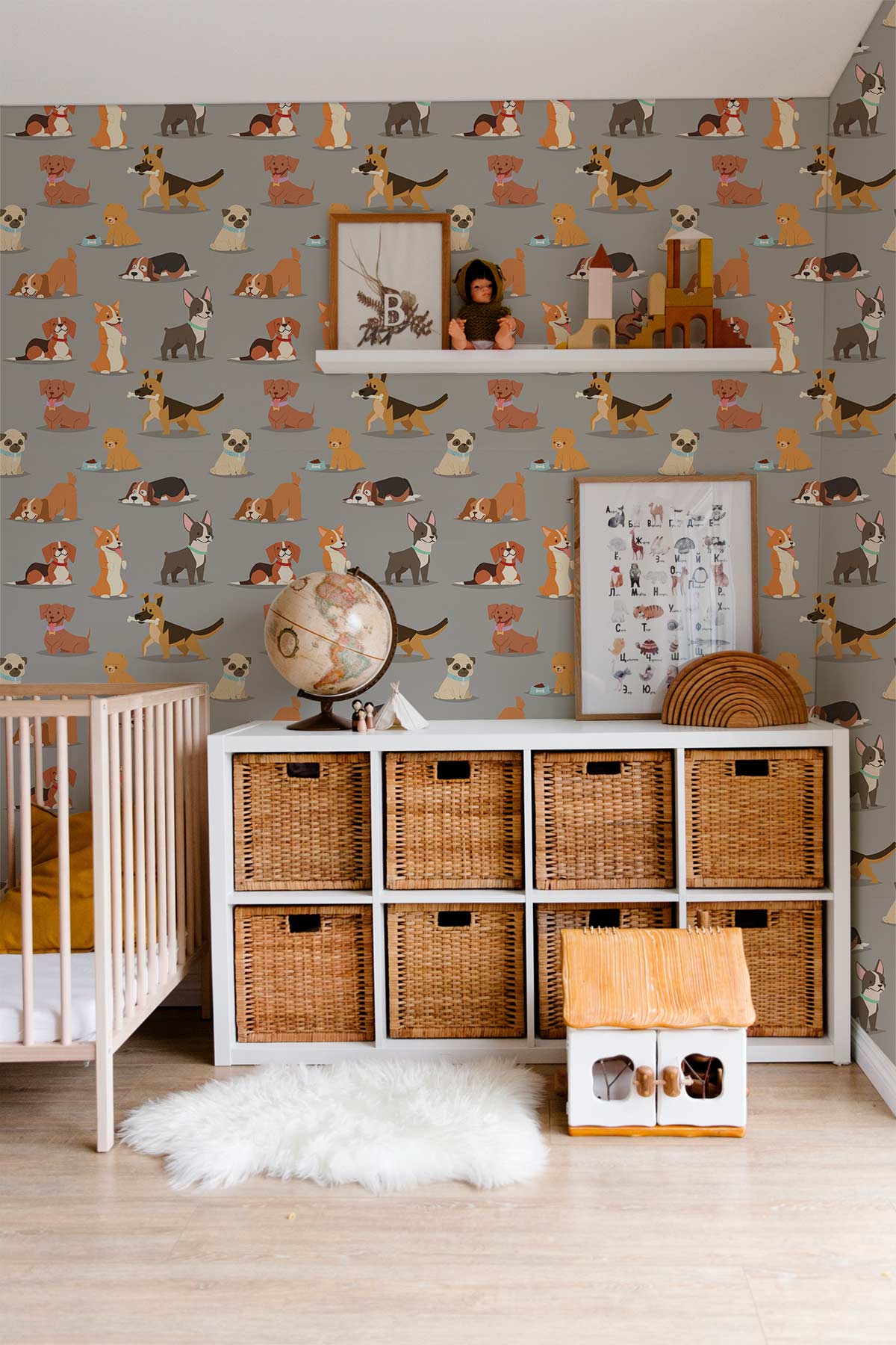 Adorable Canine Friends grey wallpaper, nursery setting, wicker storage, light wood flooring, white cot, rug.