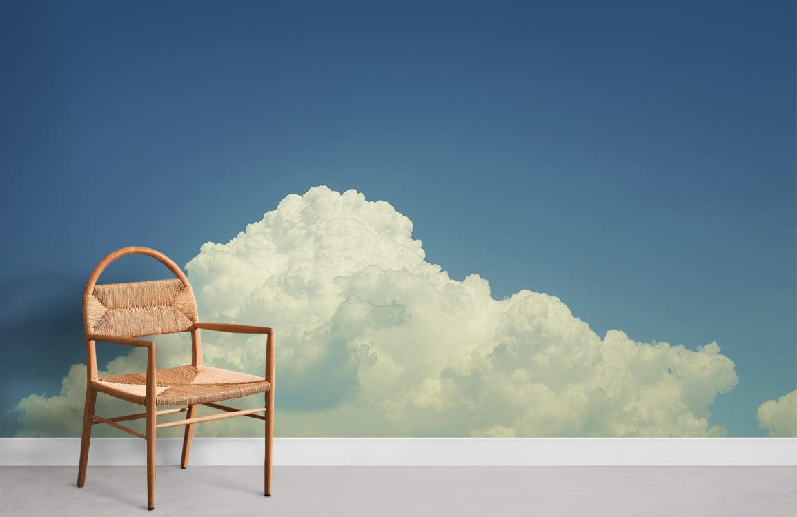 Ethereal blue sky mural, wicker chair, minimalistic room, grey flooring, peaceful decor, serene ambience.
