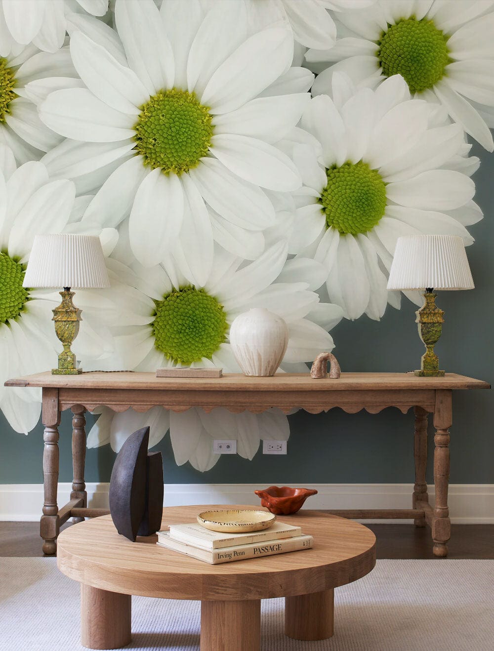 Elegant white daisy floral wallpaper, wooden table, green wall, round wooden coffee table in living room.