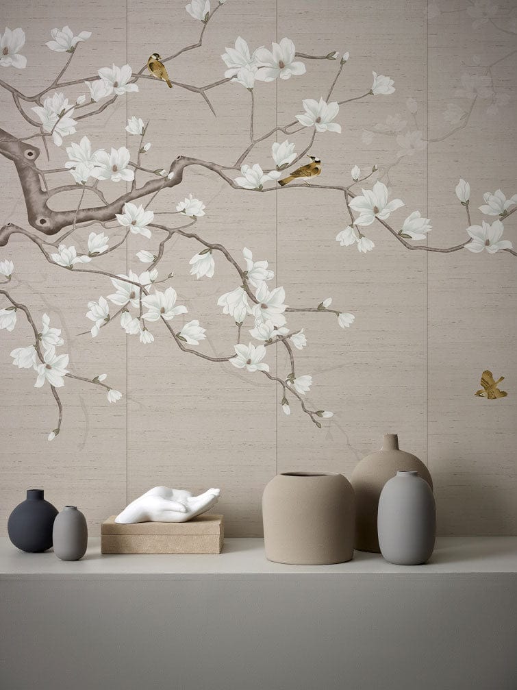 Elegant Blossom beige floral mural wallpaper with birds; neutral vases on modern shelf for peaceful decor.