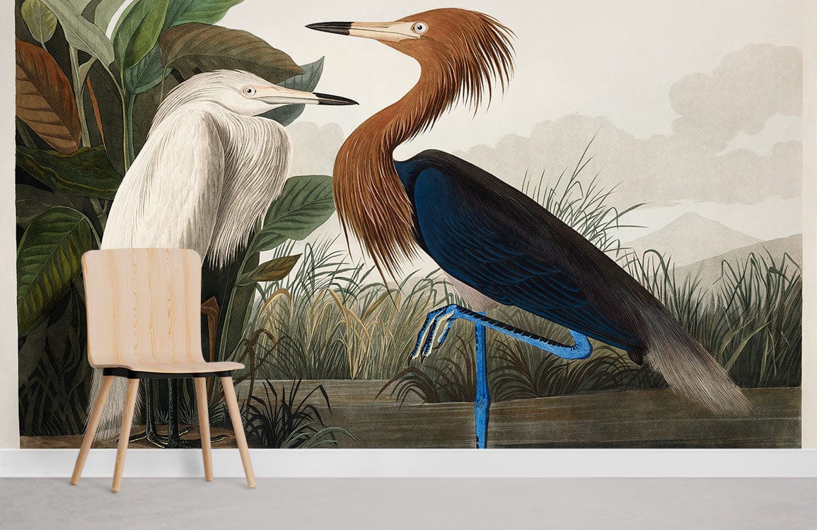 Vintage Heron mural wallpaper with wildlife motif, light wood chair, neutral wall, minimalist room setting.