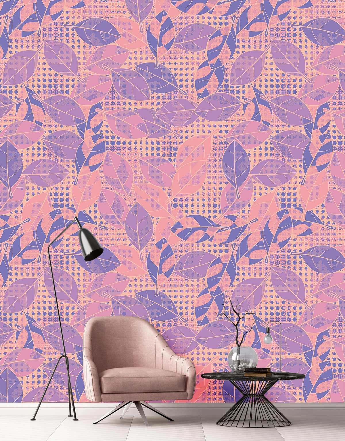 Vintage pastel leaf pattern wallpaper with pink armchair, black floor lamp, and matching decor items.