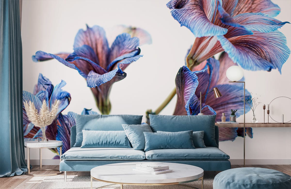 Blue and purple floral wallpaper in living room with modern blue sofa and stylish round coffee table.