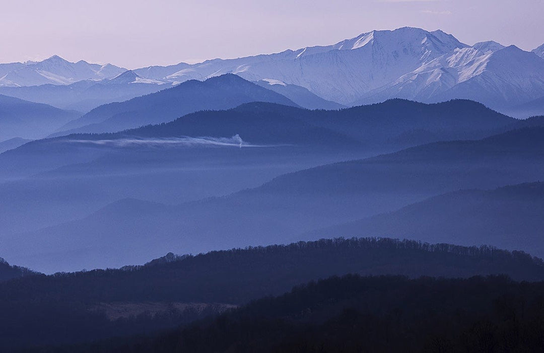 Serene Mountain Mist Blue Landscape Mural Wallpaper for Tranquil Interiors