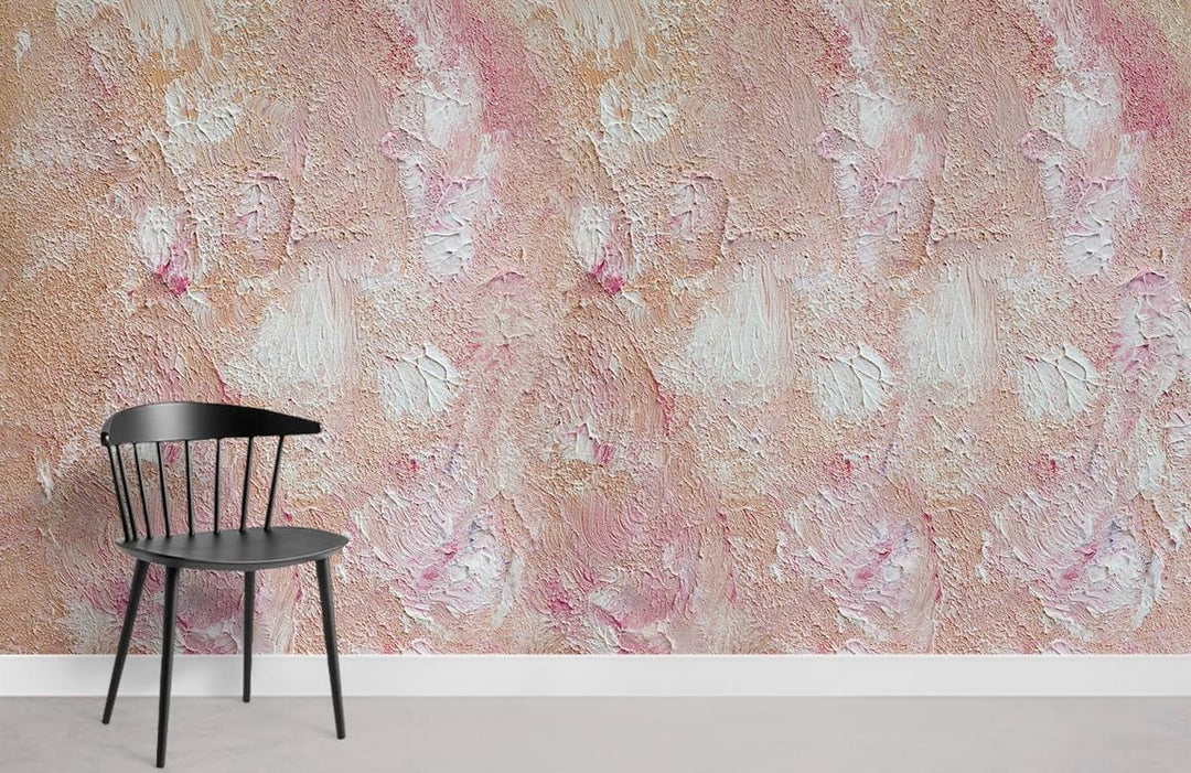 Textured Blush Pink Mural Wallpaper in modern room with black chair and light grey flooring.
