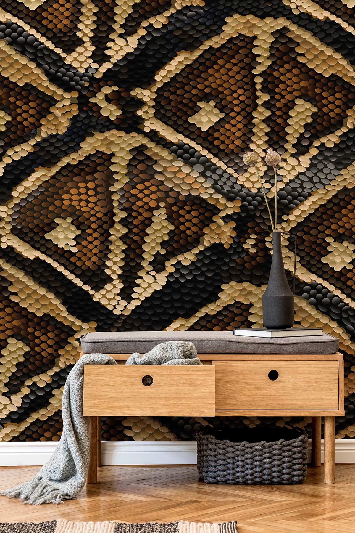 Exotic snake skin wallpaper in earthy tones with wood bench, grey cushion, herringbone flooring.