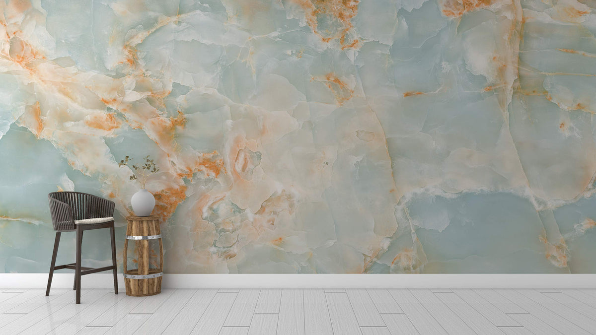 Ethereal Aqua and Coral Marble Effect Mural Wallpaper in modern room with wooden chair and vase.