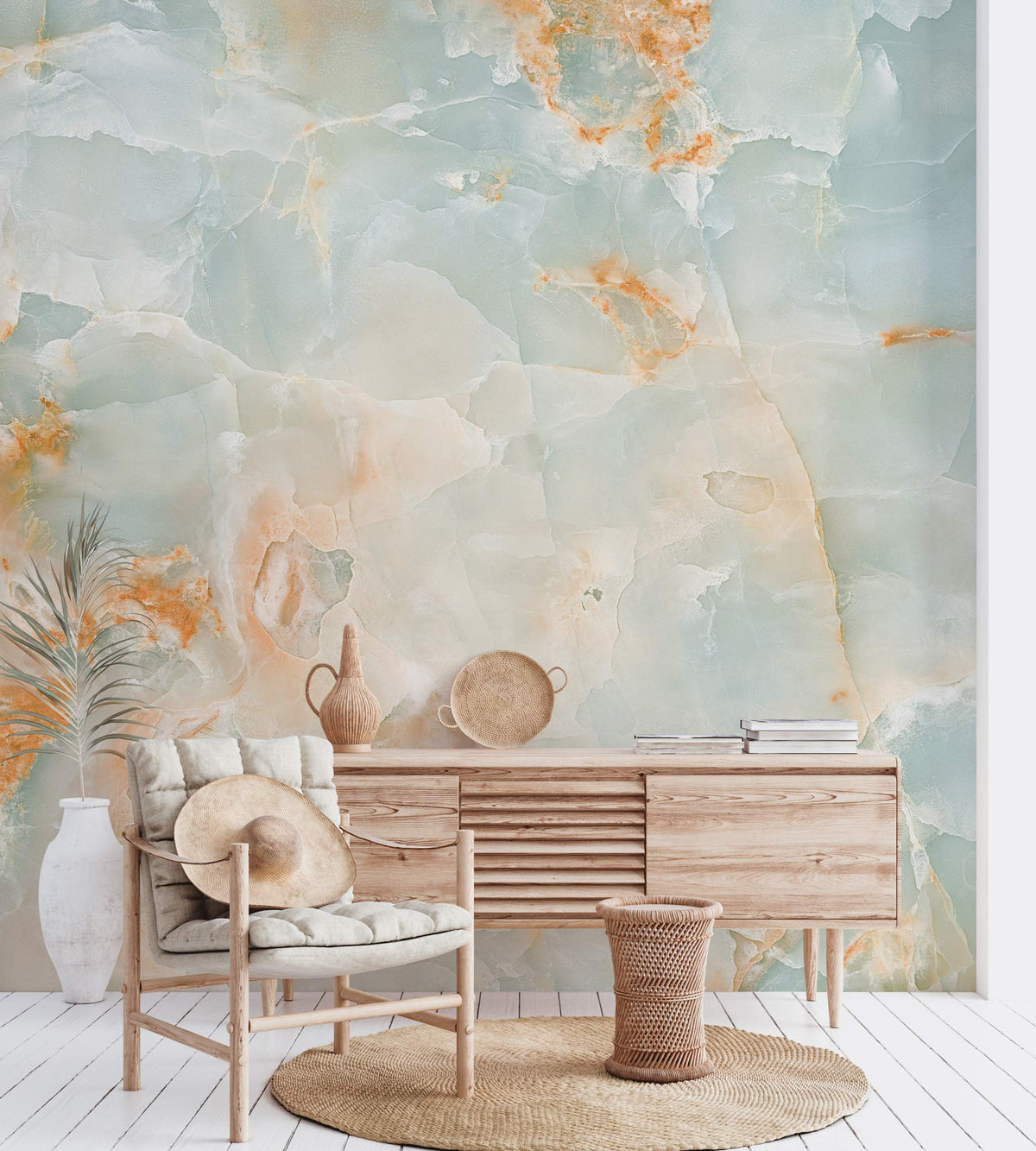 Ethereal Aqua and Coral Marble Mural Wallpaper, wooden sideboard, wicker chair, bright room decor.