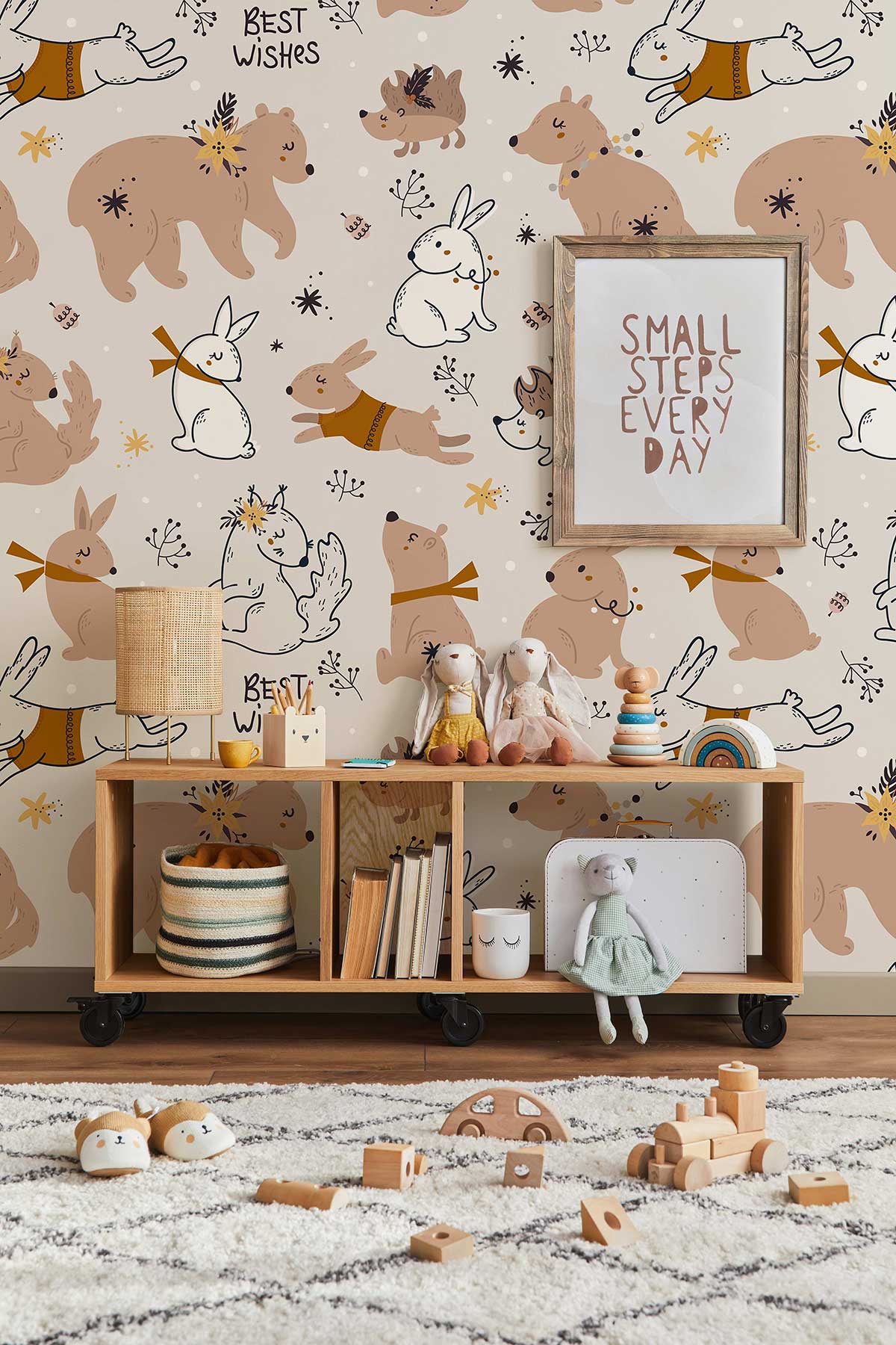 Adorable Woodland Creatures wallpaper, nursery decor with wooden shelf, toys, and framed artwork. Earthy tones.