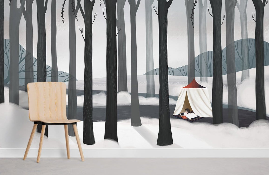 Wintry Forest Mural Wallpaper in grey woods, featuring cosy tent; wooden chair on grey floor.