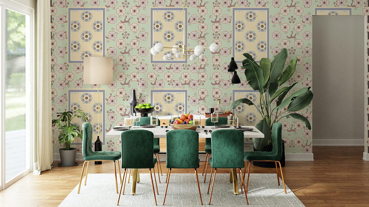 Elegant dining room with floral geometric wallpaper, green velvet chairs, wooden flooring, and a modern table.