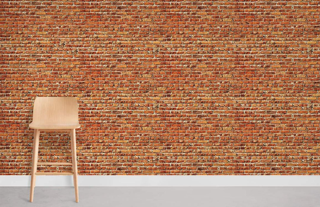 Vintage Brick Wall Effect Wallpaper, rustic red design, wooden chair, concrete flooring, industrial decor style.