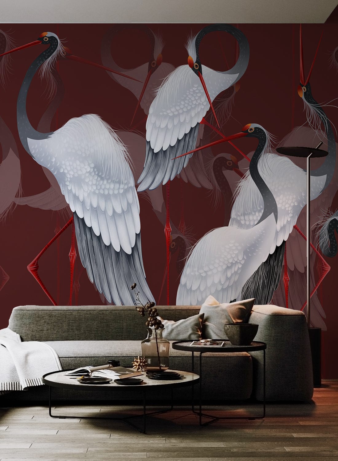 Elegant Crane Dance mural wallpaper in living room with grey sofa, wooden flooring, modern decor.