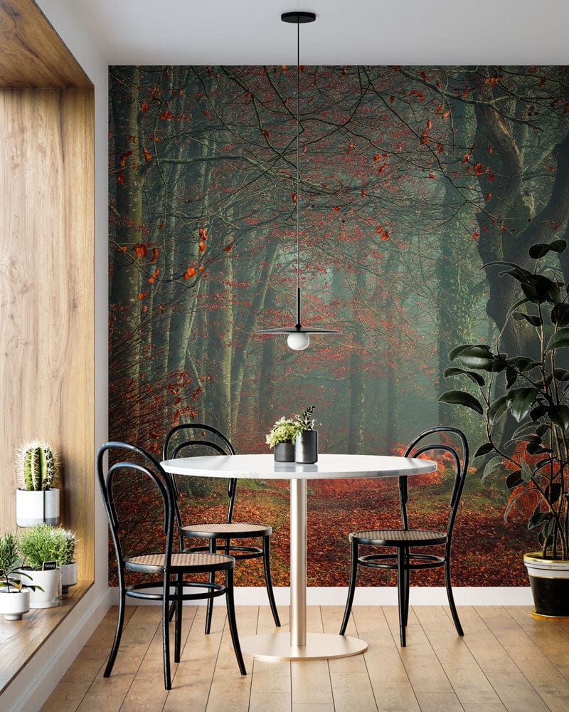 Enchanting Autumn Forest Path Mural, earthy tones; dining area, wooden floor, black chairs, pendant light.