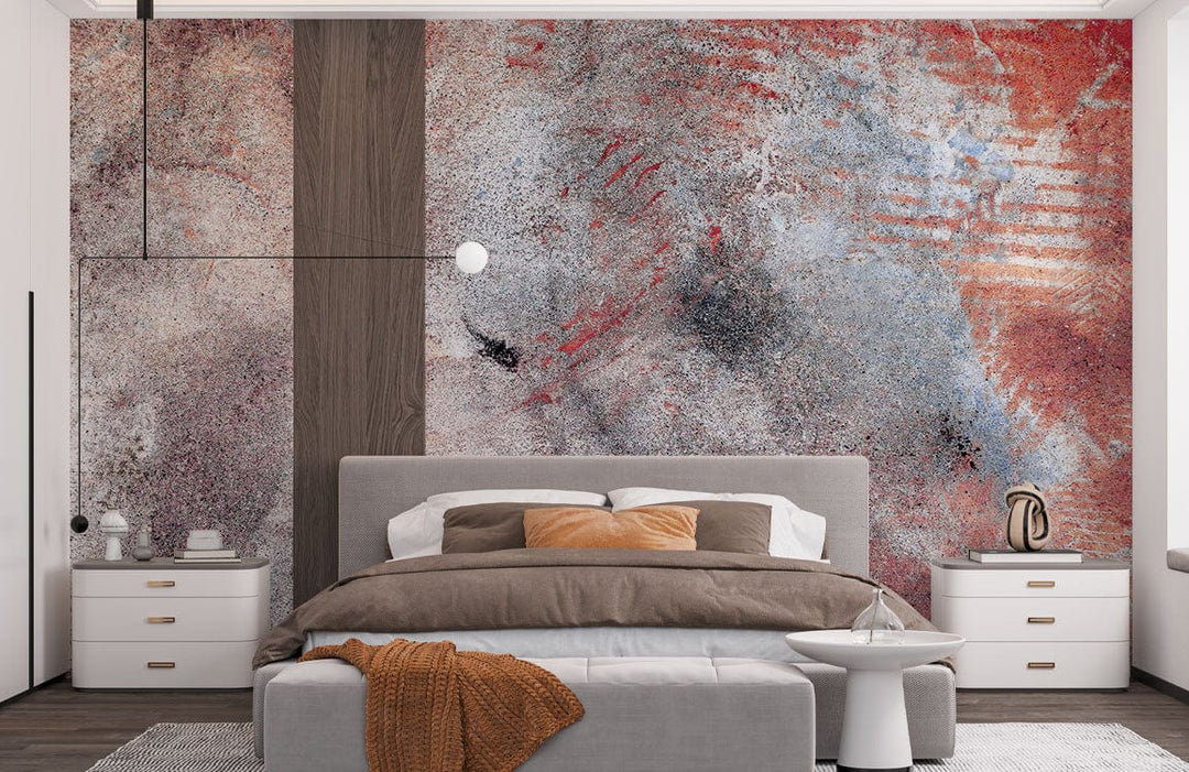 Rustic abstract textured mural wallpaper in red, grey; elegant bedroom with grey bed and modern decor.