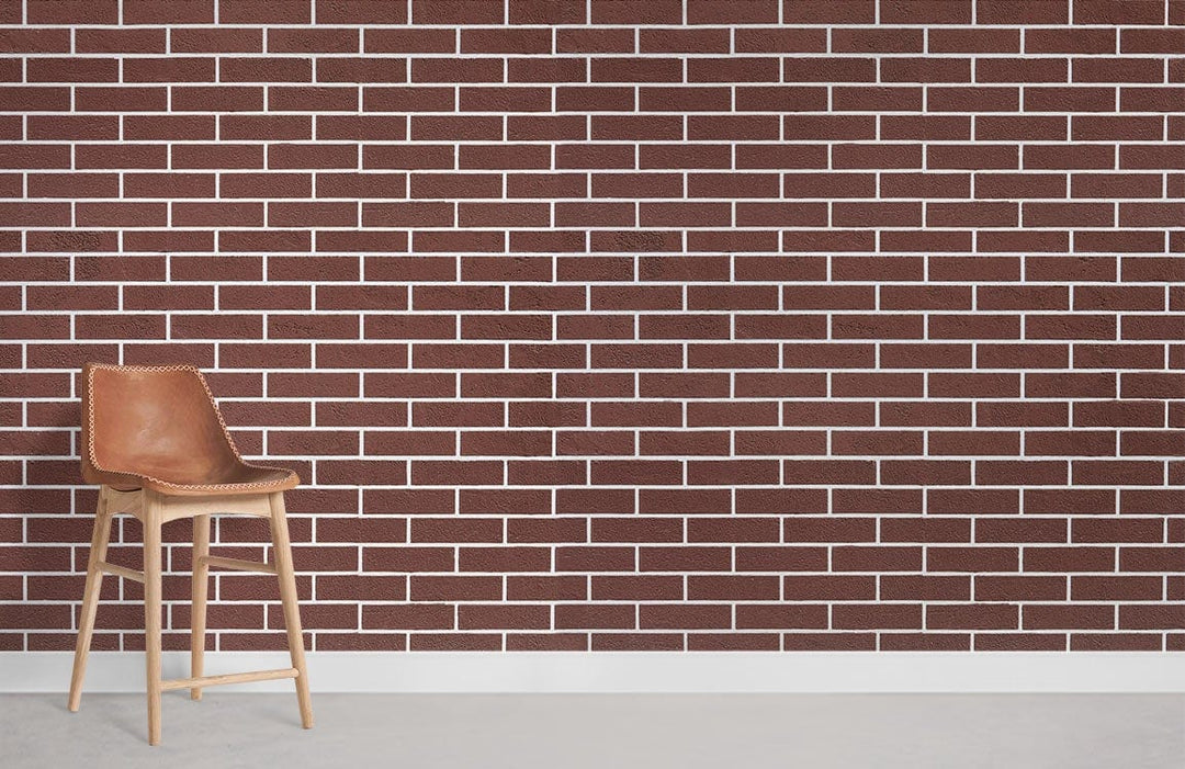 Classic red brick wallpaper with rustic industrial style, featuring a wooden bar stool on grey flooring.