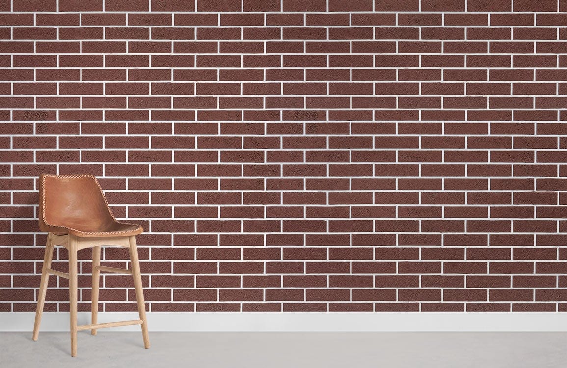 Classic red brick wallpaper with rustic industrial style, featuring a wooden bar stool on grey flooring.