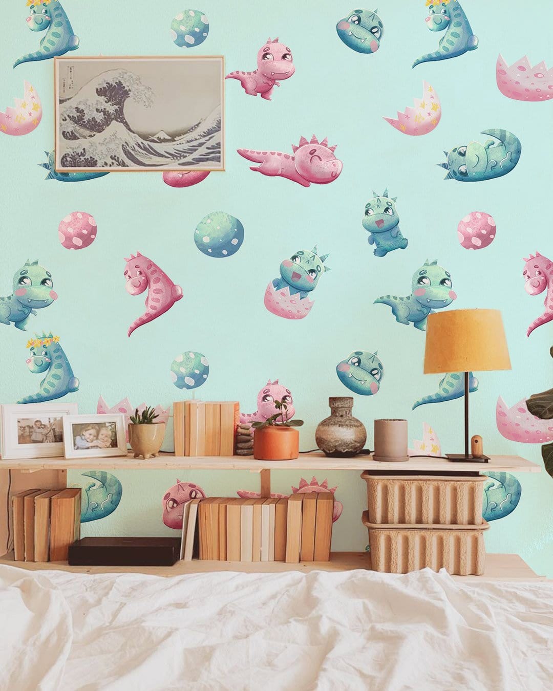 Pastel Dragon baby nursery wallpaper with pink, blue design; wooden furniture, nursery room decor.