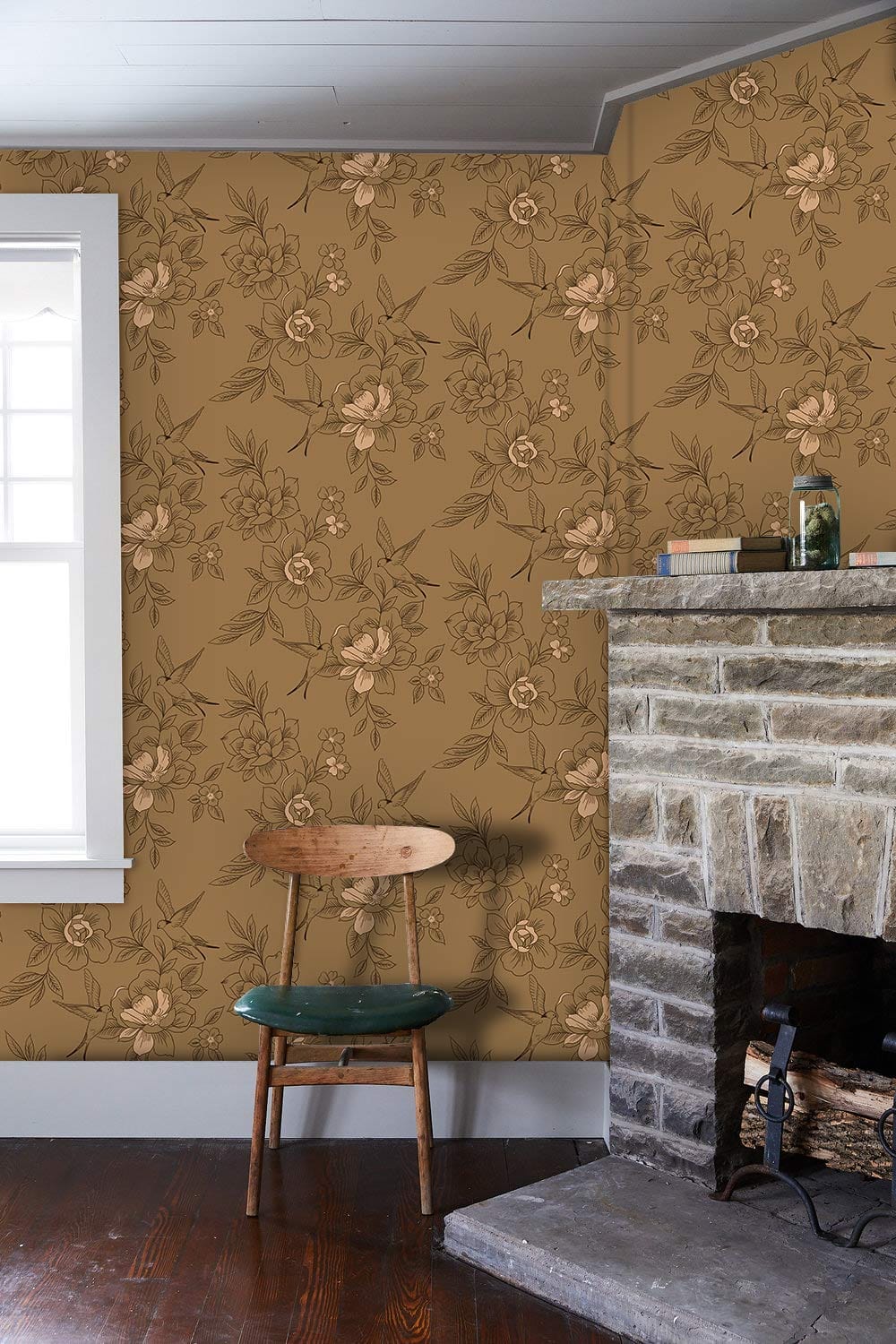 Vintage floral wallpaper in beige botanical style with stone fireplace, wooden chair, and dark flooring.