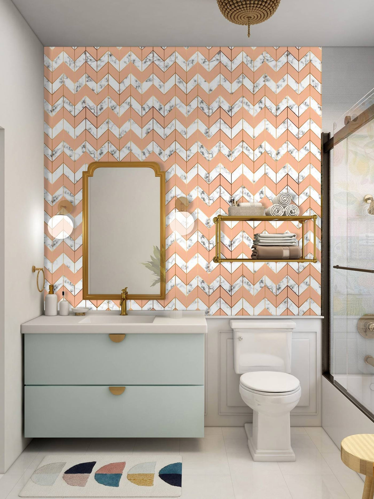 Peach Chevron Geometric Pattern Wallpaper with Marble Accent in Bathroom, featuring modern vanity, gold mirror.