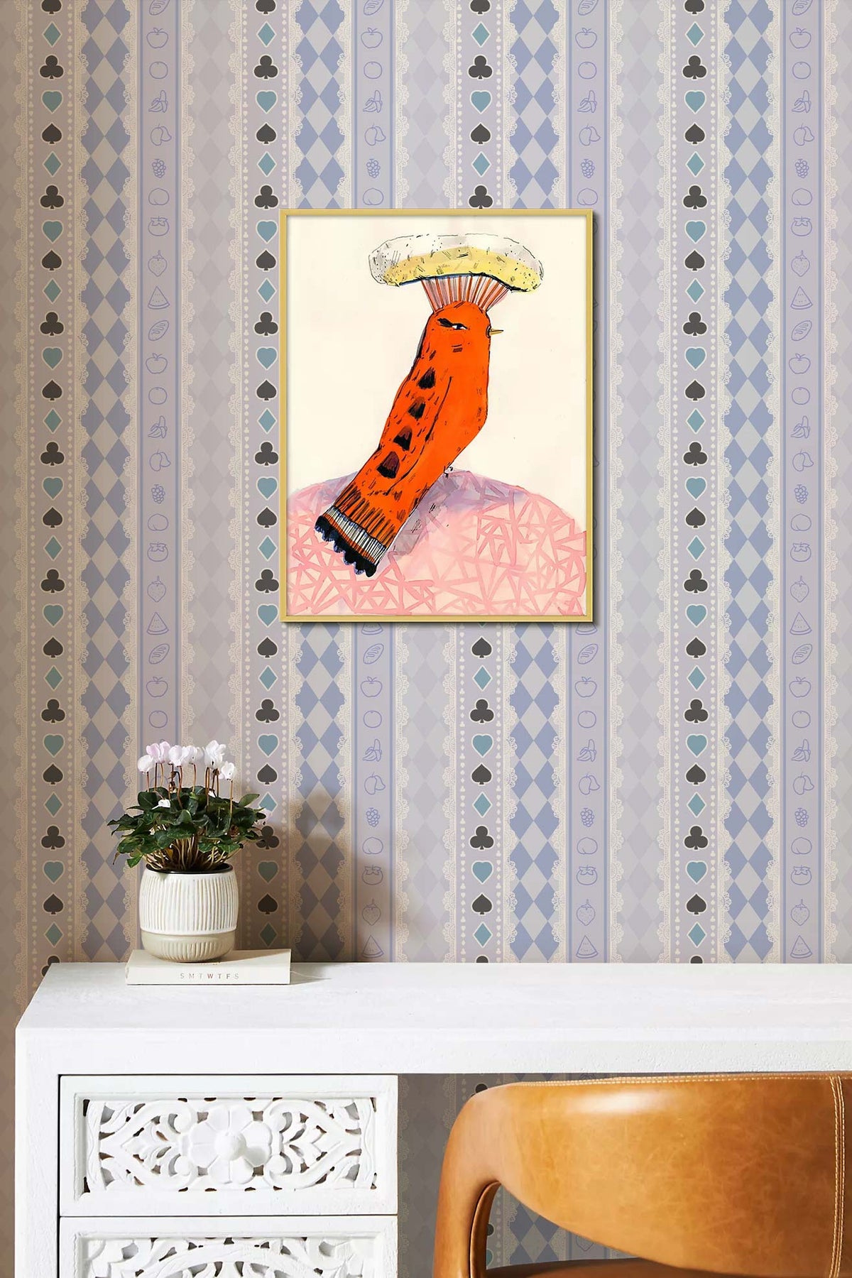 Vintage blue striped floral wallpaper in classic interior with white desk and tan chair.