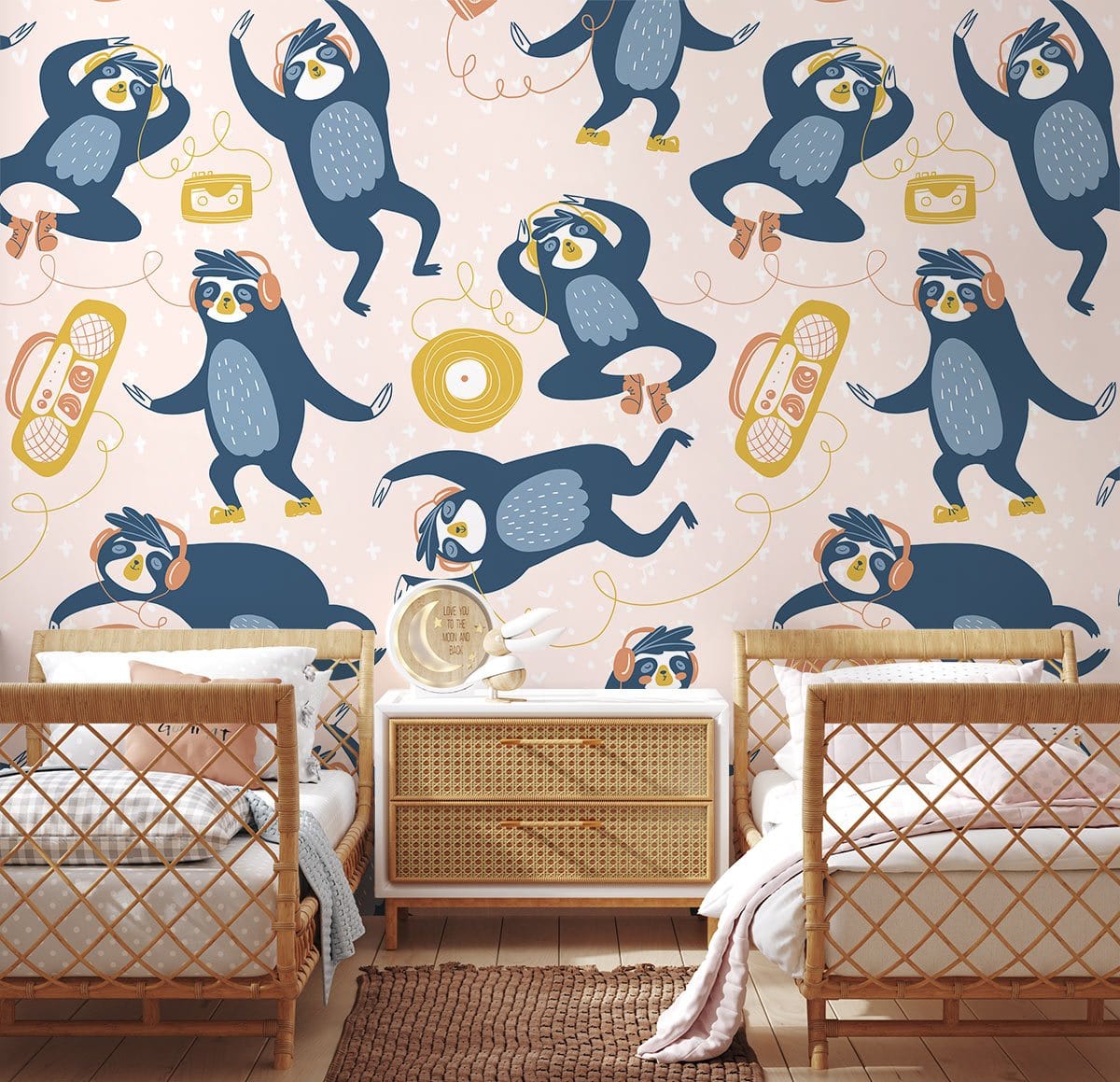 Playful Penguins Kids' Mural Wallpaper; rattan beds; wicker drawer; wooden flooring; nursery decor.