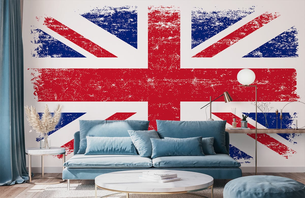 Vintage Union Jack wallpaper in living room, teal sofa, round coffee table, blue curtains, modern decor.