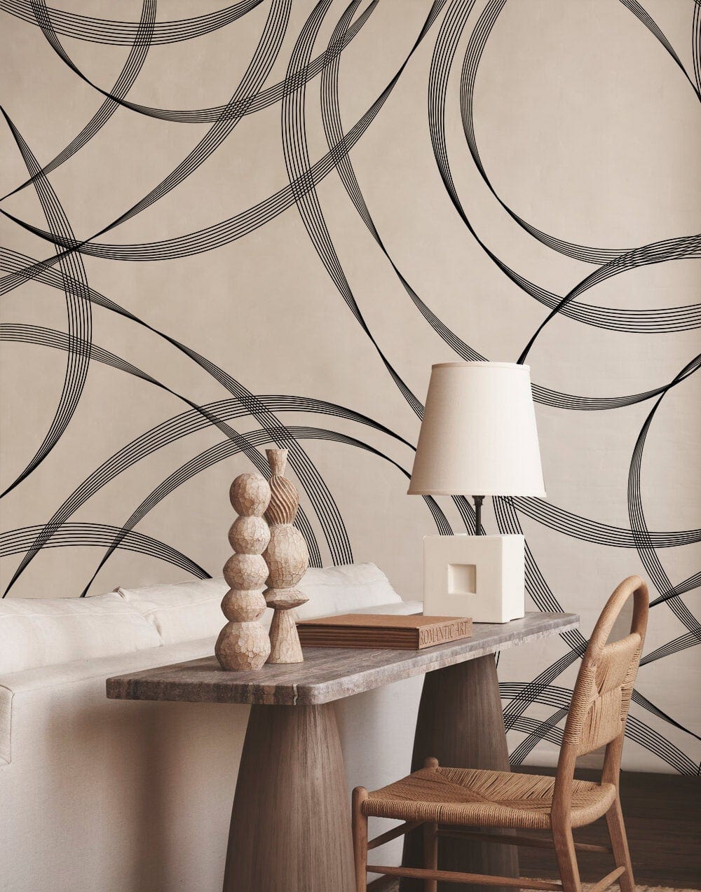 Monochrome abstract swirl wallpaper, modern interior, beige sofa, wooden table, chair, and contemporary lamp.