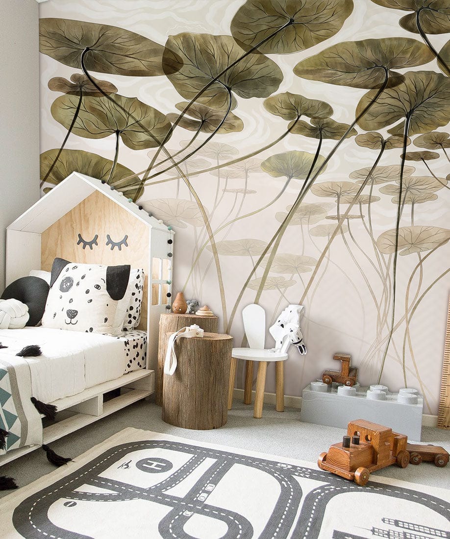 Children's bedroom with Serene Water Lilies mural wallpaper, wooden bed, toy car, and playful rug.