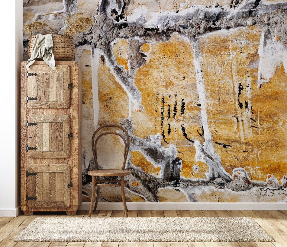 Rustic Earth Tones Abstract Stone Texture Wallpaper with Wooden Cabinet, Chair, Rug, and Wood Flooring.