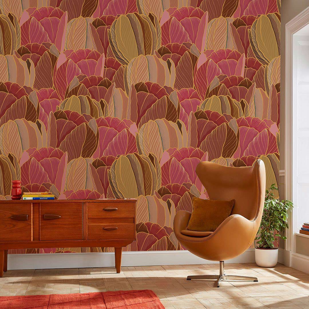 Autumnal floral tulip wallpaper in contemporary living room with brown swivel chair and wooden sideboard.