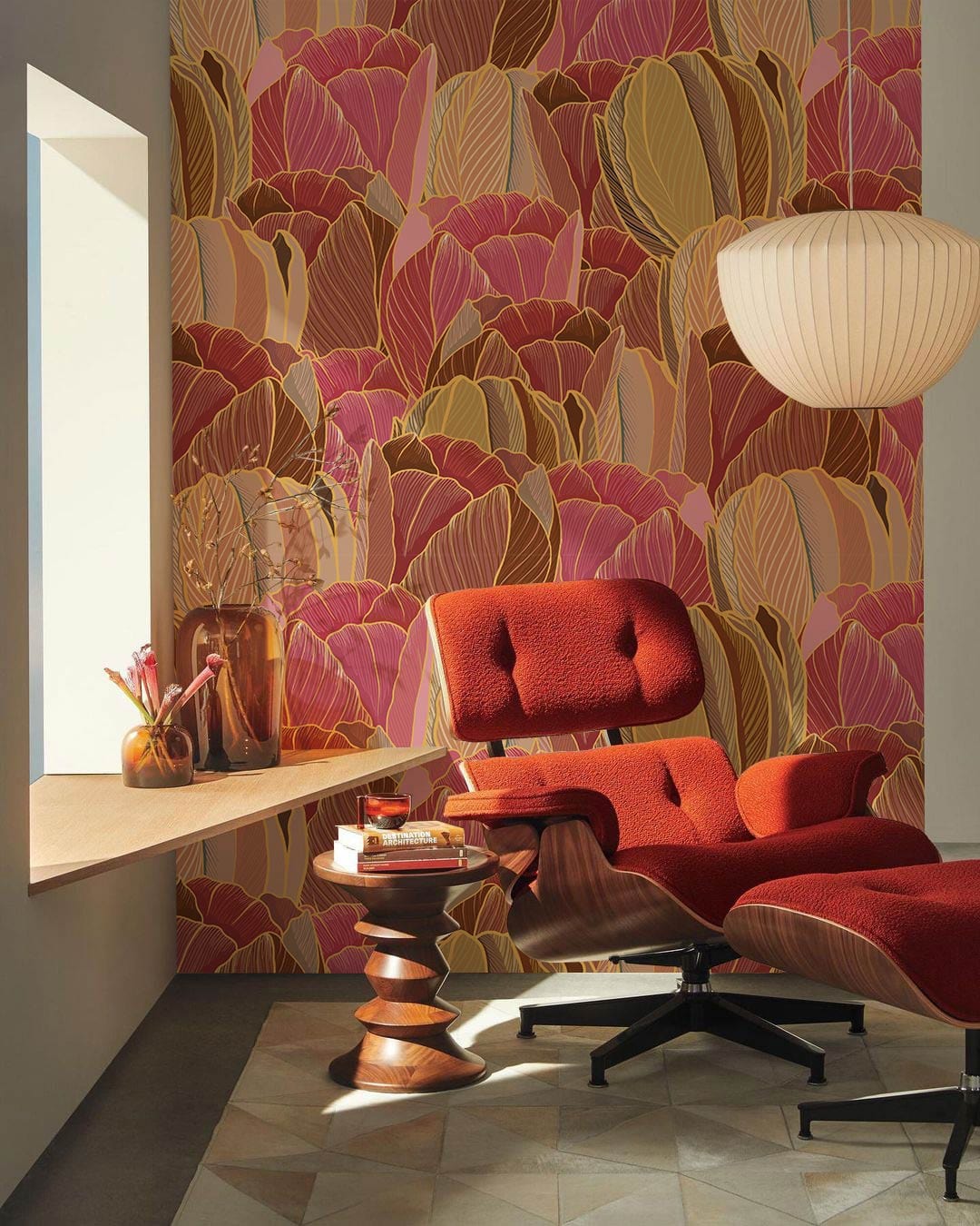 Autumnal Hues Tulip Pattern Wallpaper in living room with red modern chair, geometric floor tiles.