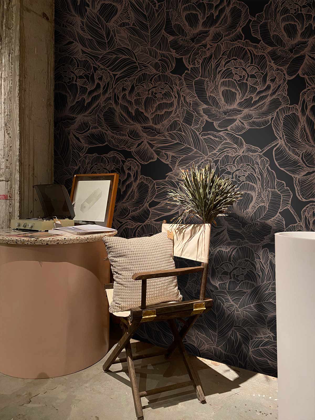 Elegant Charcoal Floral Wallpaper with botanical pattern in rustic office; wooden chair; concrete flooring.