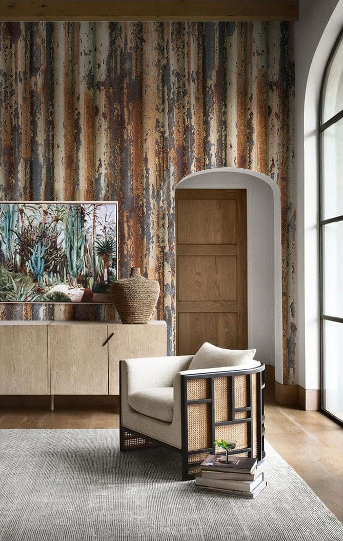 Vintage rustic industrial wallpaper, beige armchair, wooden flooring, stylish living room, brown decor accents.