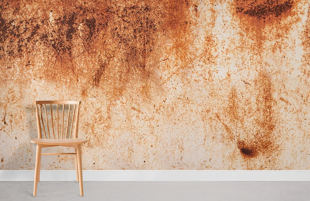 Rustic industrial textured mural wallpaper with earthy tones; wooden chair; grey flooring; living room setting.