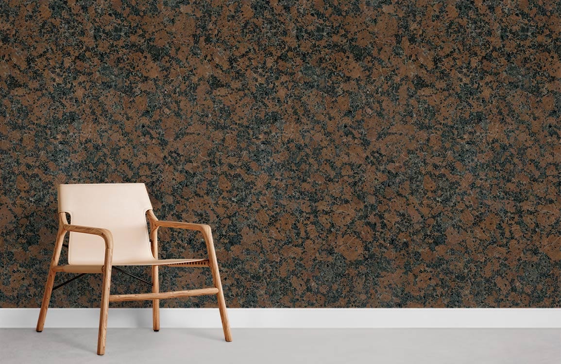 Alt text: Rustic Granite Effect Wallpaper, earthy browns, black, light wooden chair, minimalist room setting.