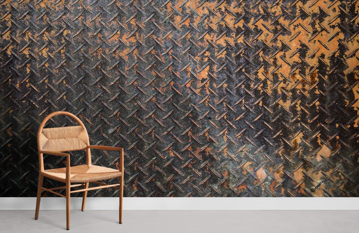 Industrial rust mural wallpaper in weathered brown and black with woven chair on grey flooring.