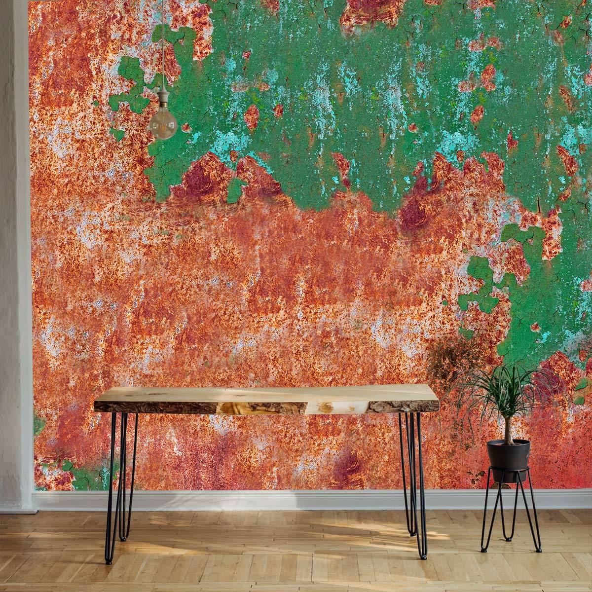 Vintage Rustic Rusty Metal Textured Wallpaper in Green and Red, wooden table, parquet flooring, indoor decor.