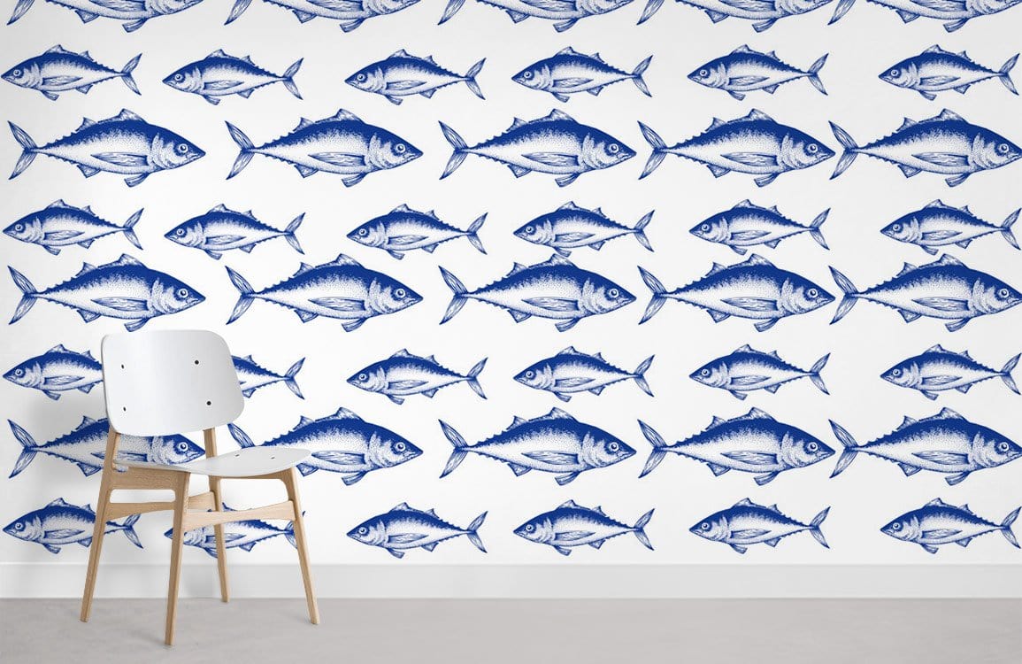 Nautical blue fish pattern wallpaper with white modern chair, coastal decor, minimalist room setting.
