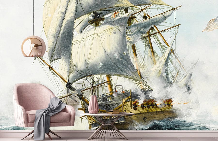 Vintage Nautical Ship mural wallpaper in soft tones; pink armchair; modern table; living room decor.