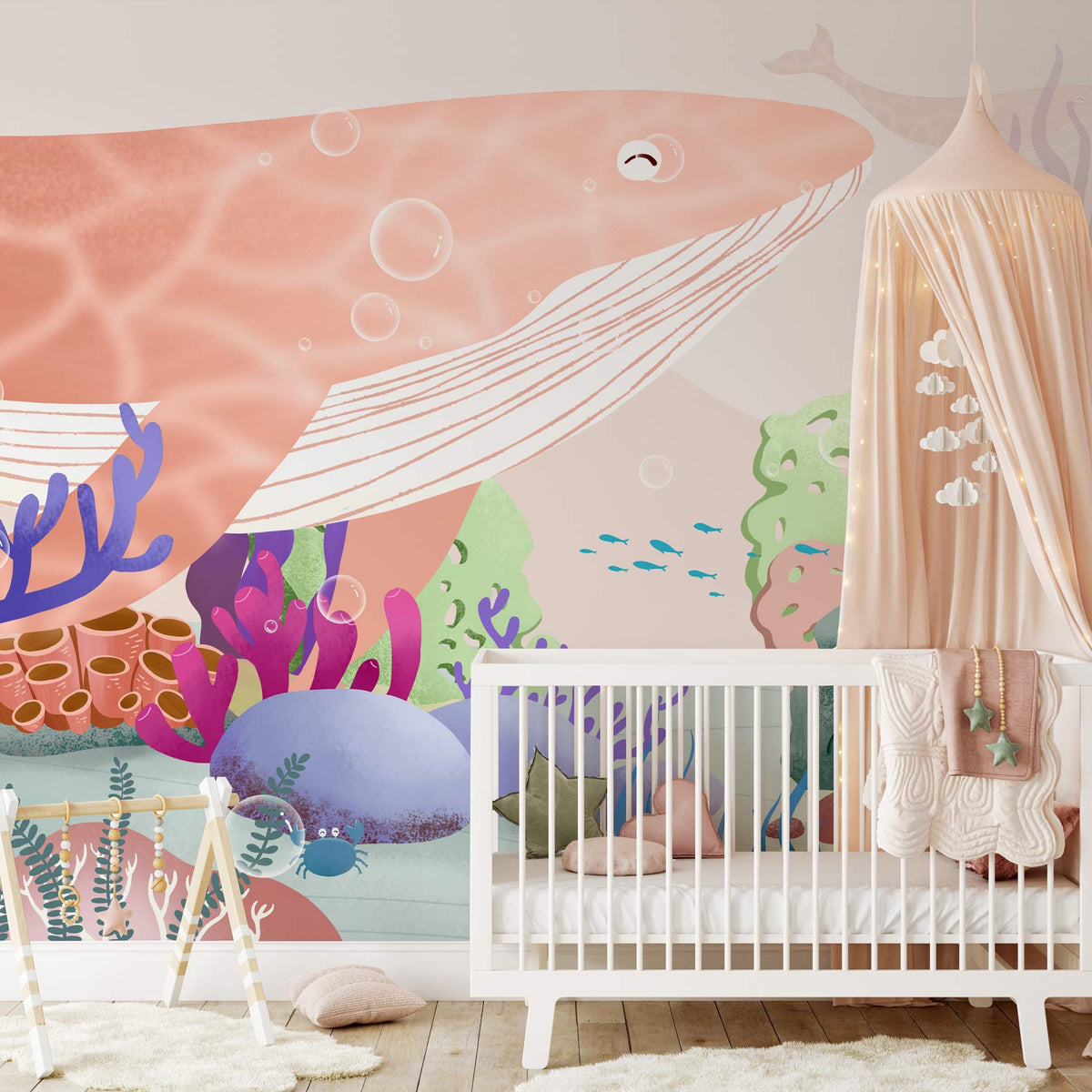 Vibrant underwater mural wallpaper with coral, whale design, white crib, and light wood flooring in nursery.