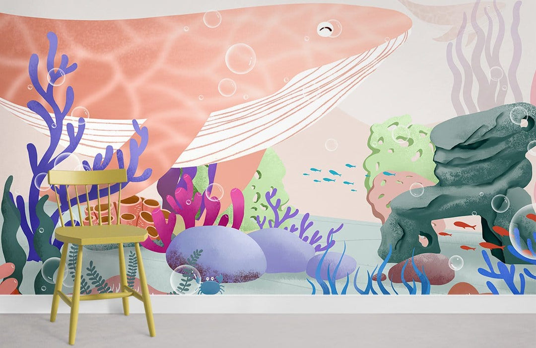 Vibrant Underwater Wonderland mural, coral and whale design, includes yellow chair, pale flooring, playful decor.